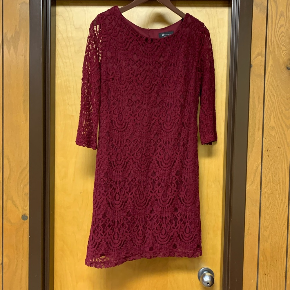 Burgundy quarter length sleeve lace dress